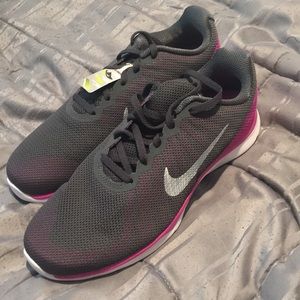 Pink white and gray Nikes